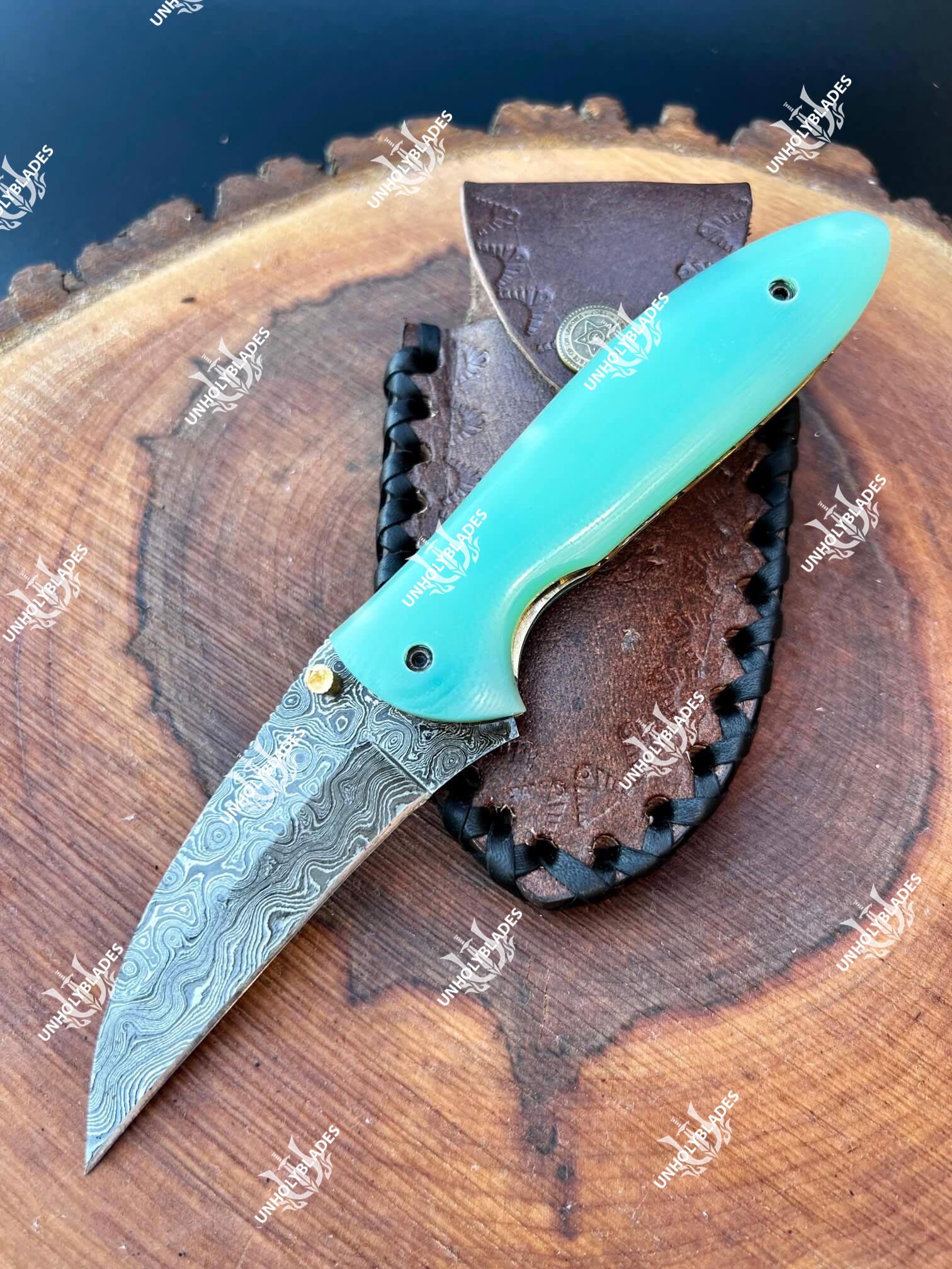 Damascus Folding Knife with Raindrop Pattern