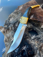 Folding knife with Black Micarta engraved brass guard