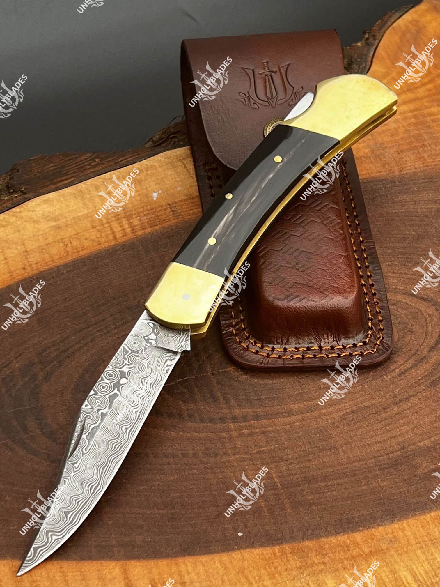 Artisan Damascus Steel Folding Knife with Buffalo Horn Handle main image 0